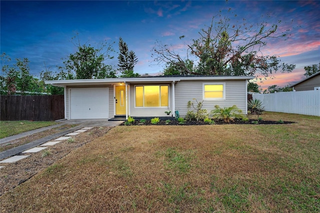 6524 14th St N, Saint Petersburg, FL 33702 - view of front of home with driveway and a garage