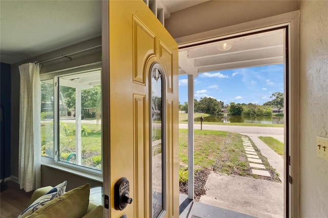 6524 14th St N, Saint Petersburg, FL 33702 - doorway with a water view and plenty of natural light