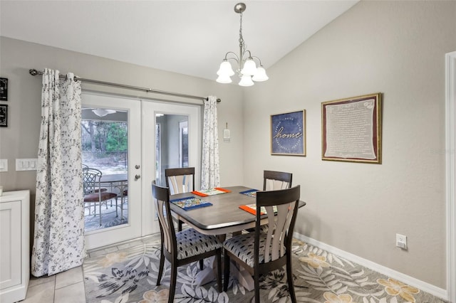 dining room with vaulted ceiling and french doors