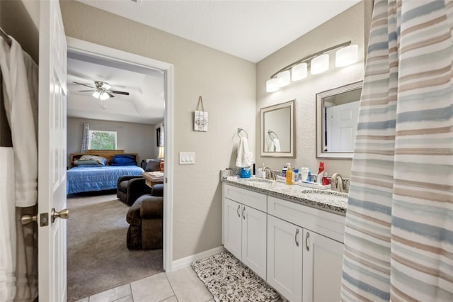 bathroom with vanity and tile patterned flooring