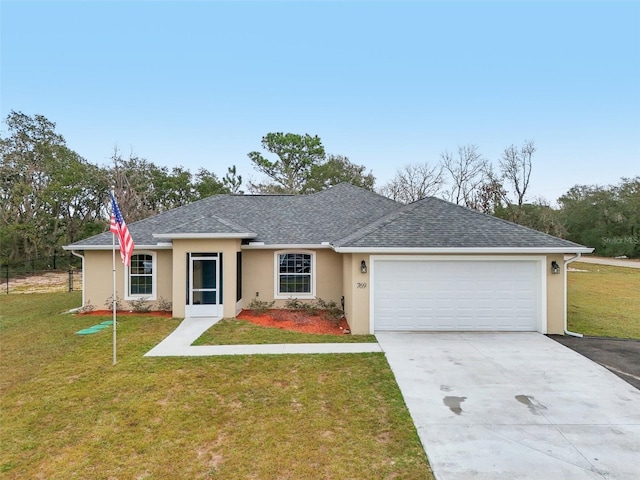 single story home with a front lawn and a garage