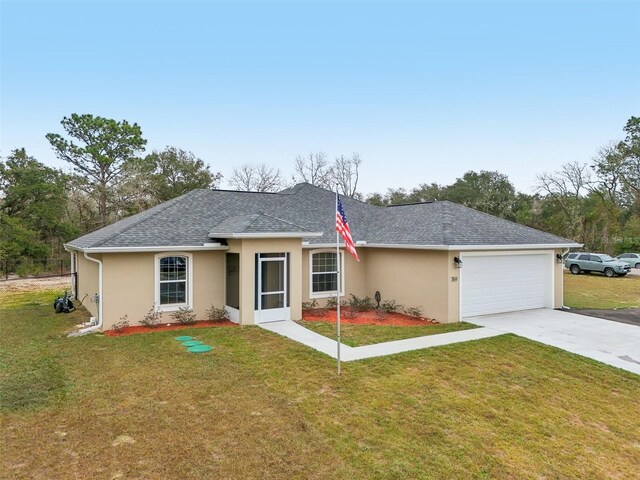 single story home featuring a front yard and a garage