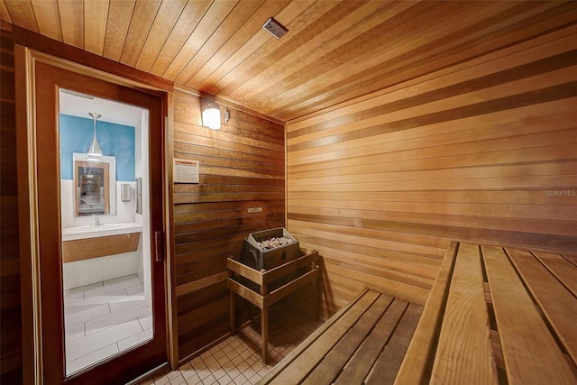 view of sauna with tile patterned flooring