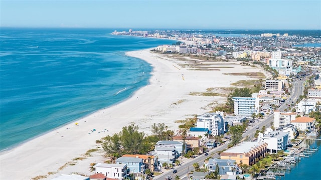 drone / aerial view with a view of the beach and a water view