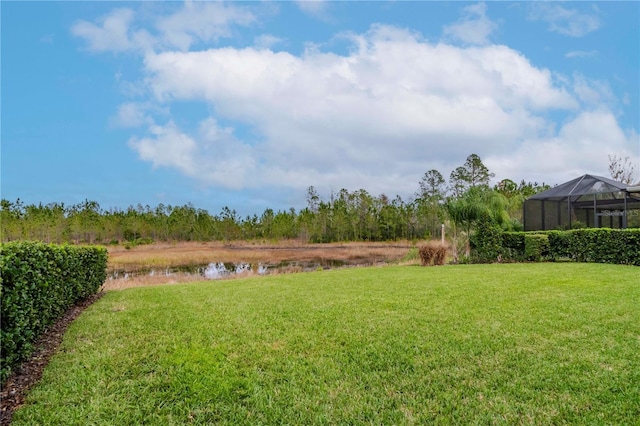 view of yard with a lanai