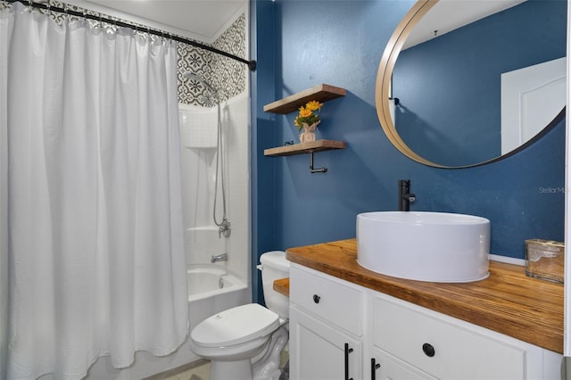 full bathroom featuring shower / bath combination with curtain, toilet, and vanity