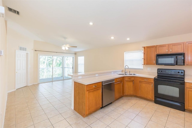 kitchen with black appliances, ceiling fan, light tile patterned flooring, and sink