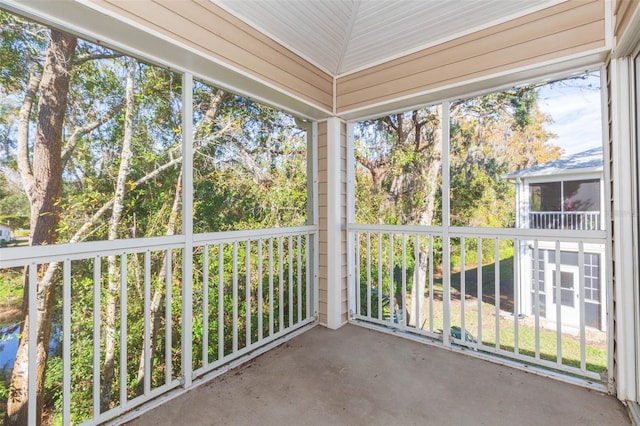 unfurnished sunroom with a healthy amount of sunlight