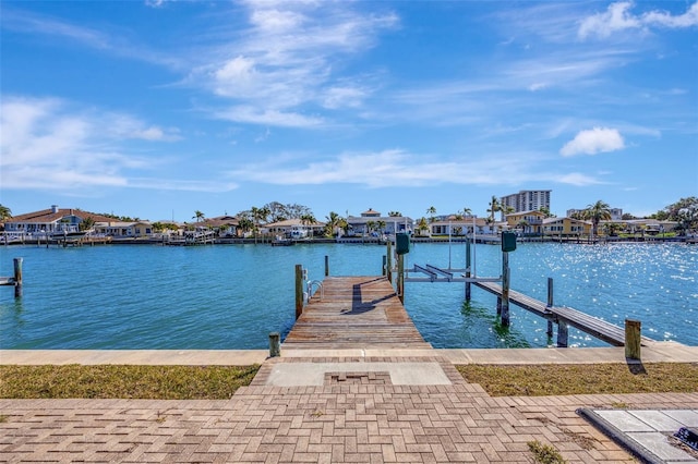 dock area with a water view