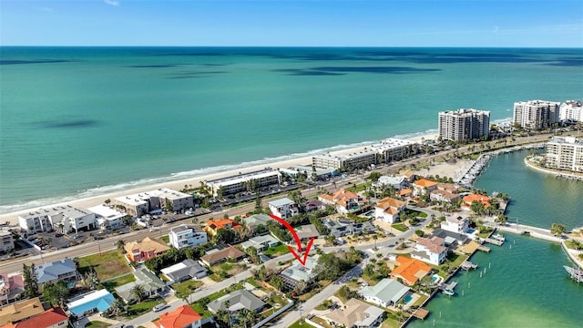 bird's eye view with a beach view and a water view