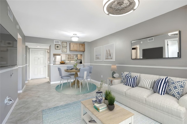 6923 Stonesthrow Cir N Unit 4105, Saint Petersburg, FL 33710 - living area with baseboards and light tile patterned floors