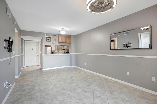 interior space featuring light tile patterned flooring