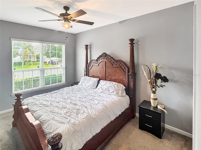 bedroom featuring ceiling fan and carpet floors