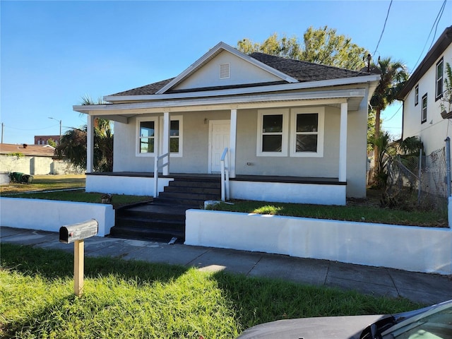 bungalow-style house with covered porch