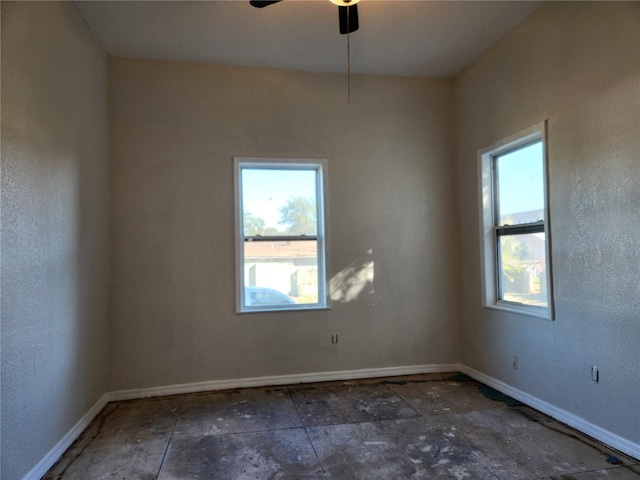 unfurnished room featuring ceiling fan