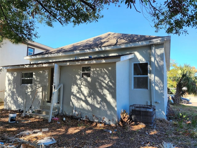 view of property exterior with cooling unit