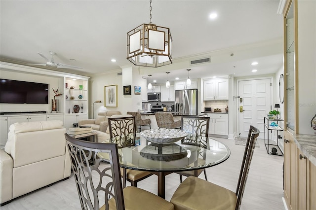 dining space with ornamental molding, recessed lighting, visible vents, and a ceiling fan