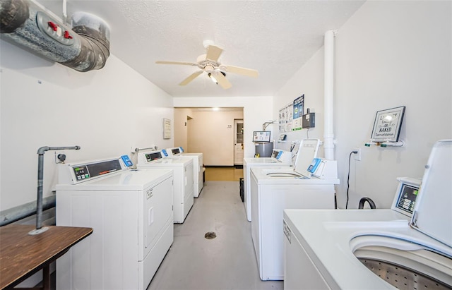 laundry area featuring ceiling fan, washer and clothes dryer, and a textured ceiling