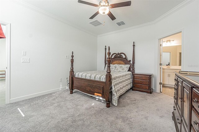 bedroom featuring ornamental molding, connected bathroom, light carpet, and ceiling fan