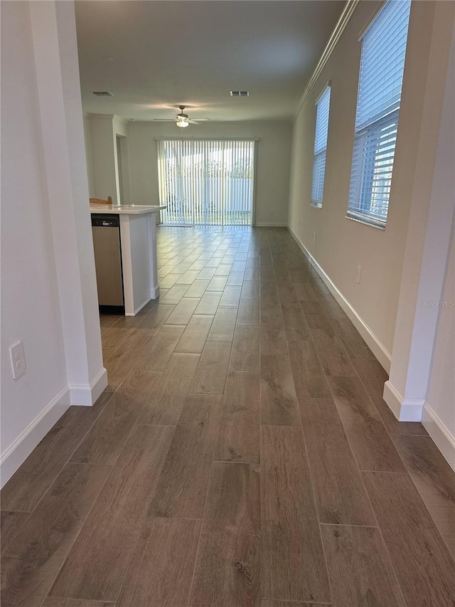 unfurnished room featuring ceiling fan and dark hardwood / wood-style flooring