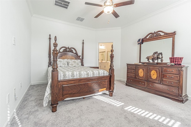 bedroom with ceiling fan, light colored carpet, ornamental molding, and ensuite bath