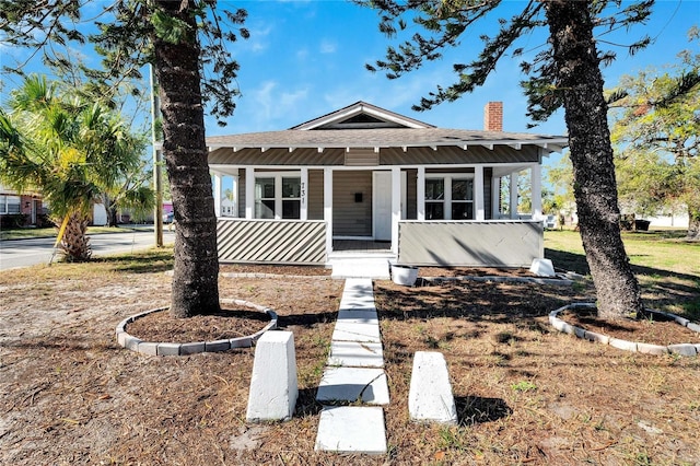 bungalow-style house featuring covered porch