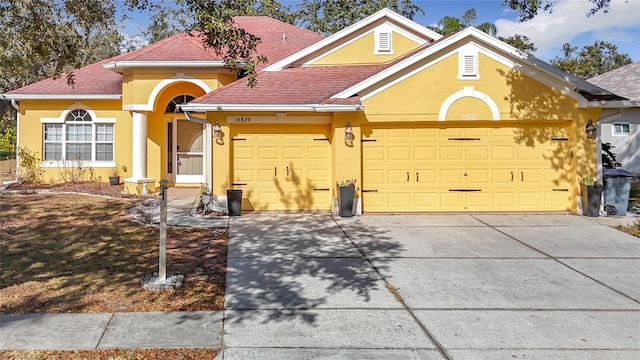 front of property featuring a garage