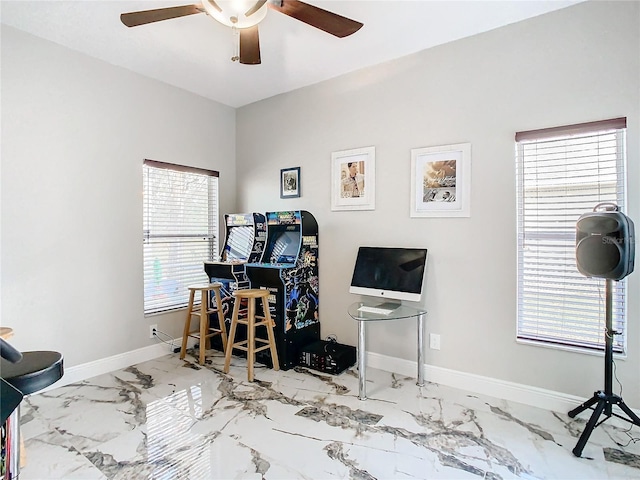 office space featuring ceiling fan