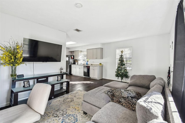 living room featuring dark hardwood / wood-style floors