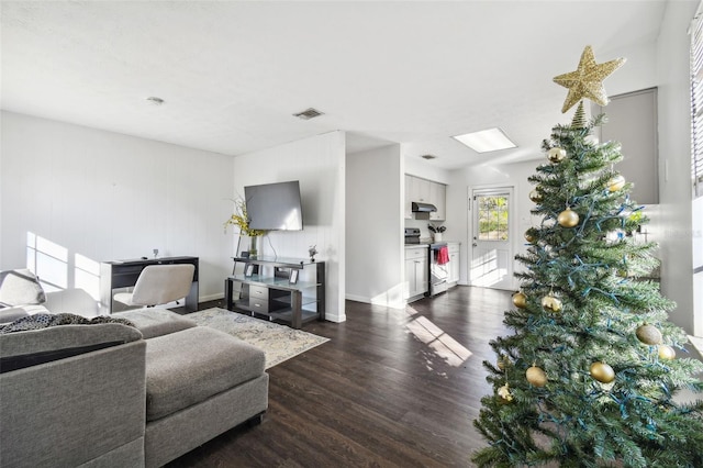 living room featuring dark hardwood / wood-style floors