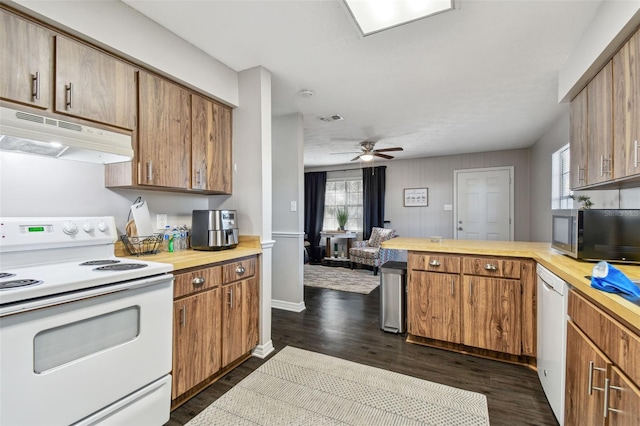 kitchen with white appliances, ceiling fan, and dark wood-type flooring