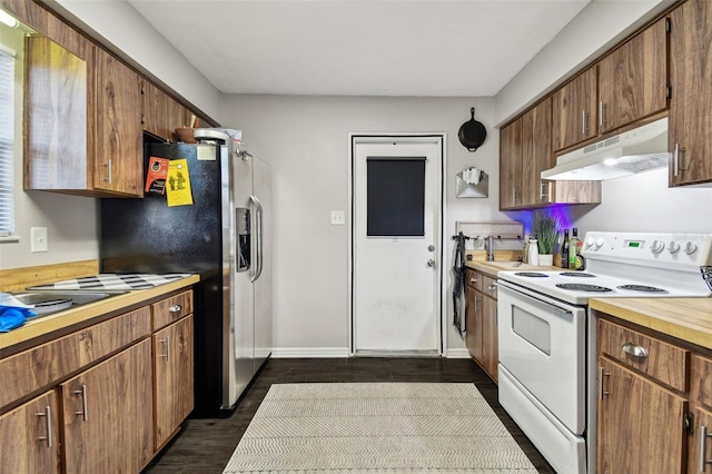 kitchen featuring stainless steel fridge with ice dispenser, dark hardwood / wood-style floors, white electric stove, and sink