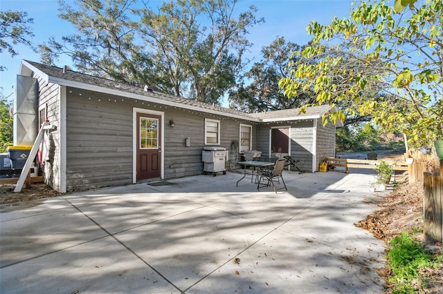 rear view of property with a patio area