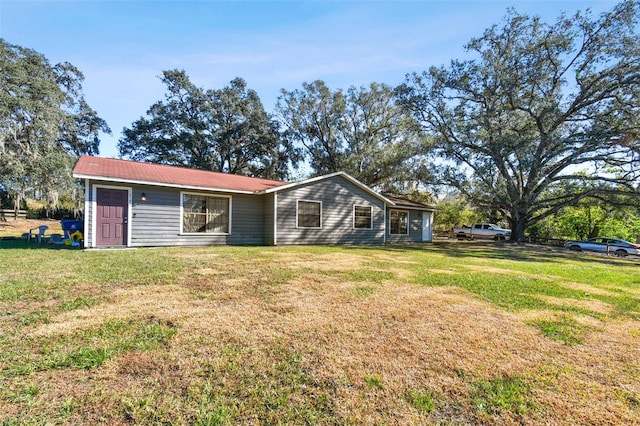 view of front of home with a front lawn