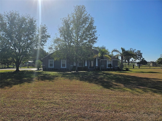 view of front facade with a front yard