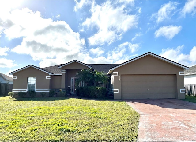 ranch-style home with a front yard and a garage