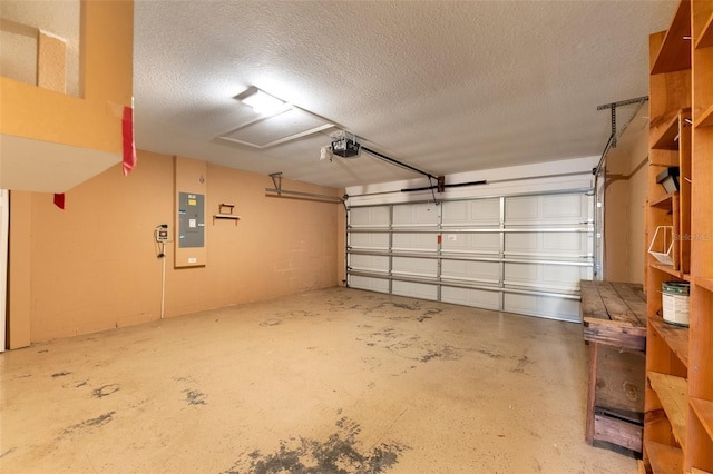 garage featuring a garage door opener and electric panel