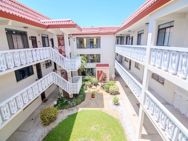 view of community with stairs