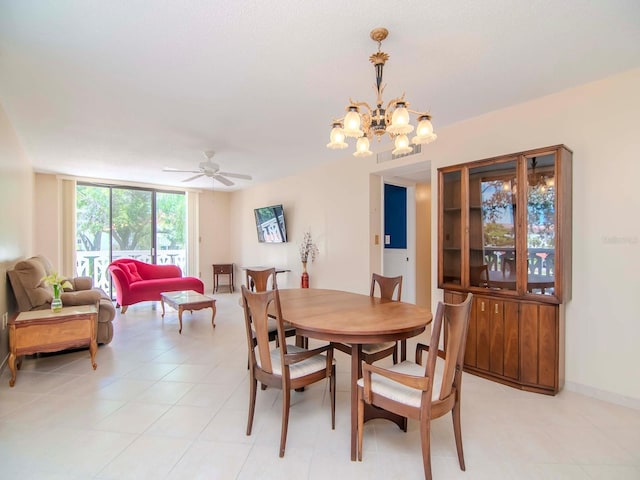 dining area with ceiling fan with notable chandelier