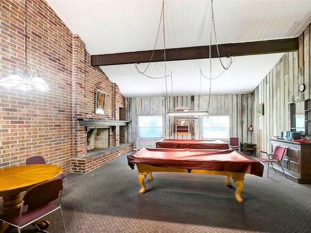 recreation room featuring lofted ceiling with beams, brick wall, pool table, carpet flooring, and a fireplace