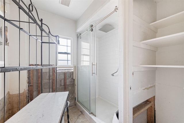 bathroom featuring walk in shower