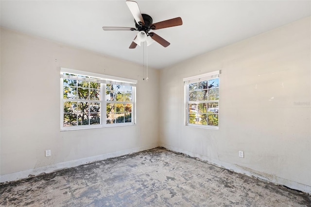 unfurnished room with plenty of natural light and ceiling fan