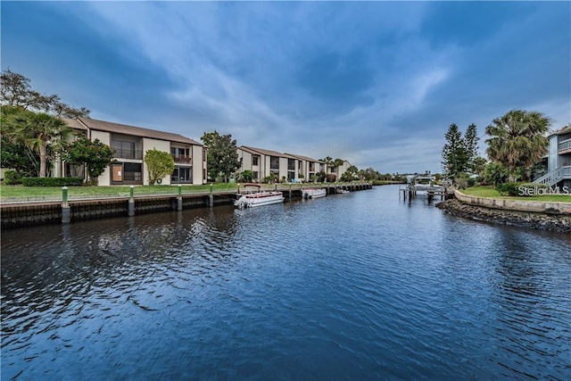 view of water feature with a dock