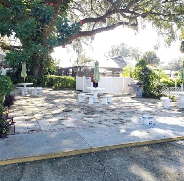 view of patio featuring a grill