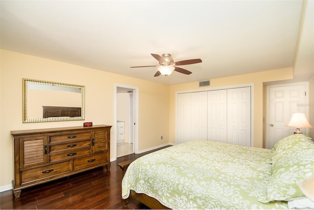 bedroom featuring a closet, dark hardwood / wood-style floors, and ceiling fan