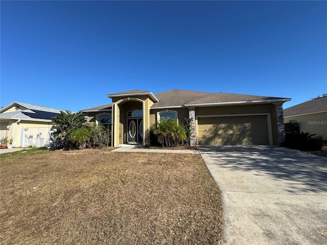 view of front of home with a garage