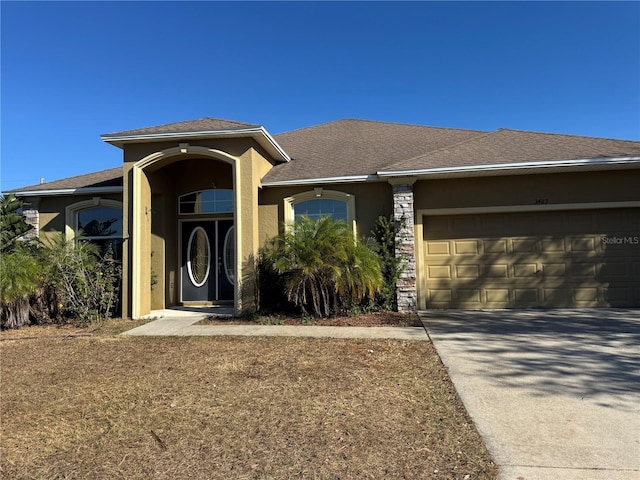 view of front of house with a garage