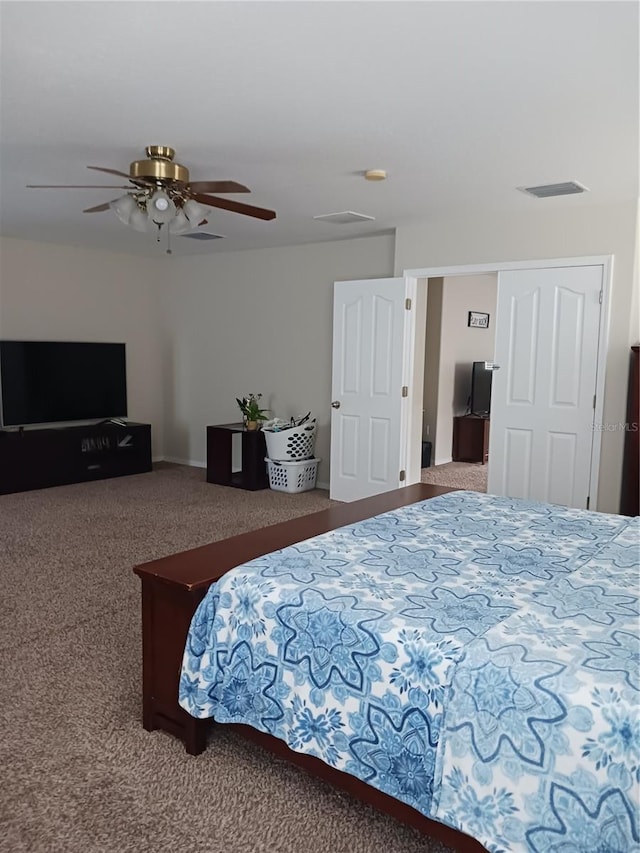 bedroom featuring ceiling fan and carpet floors