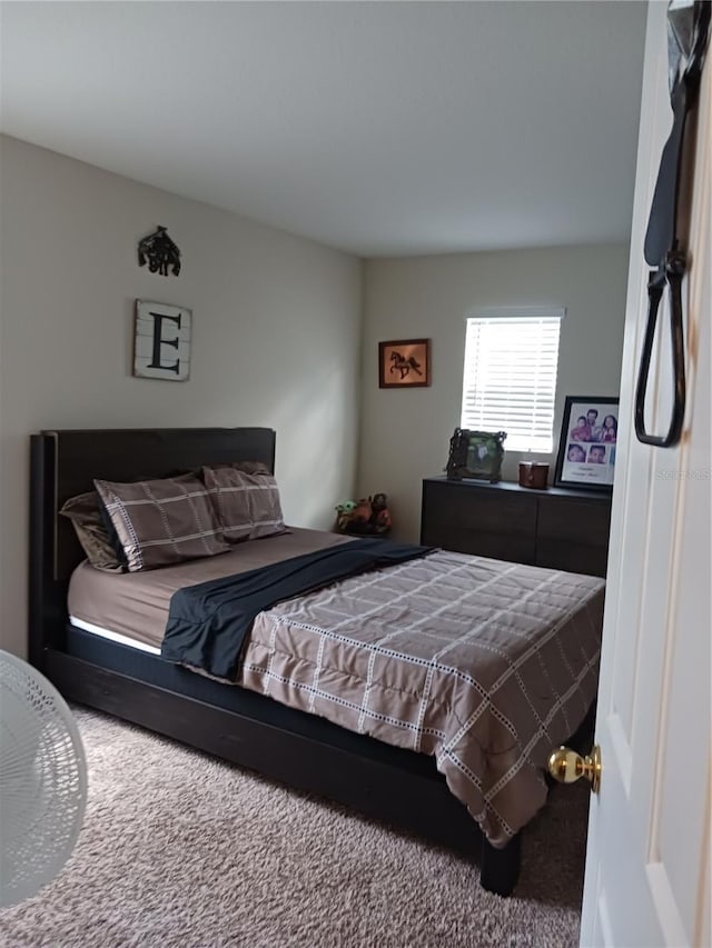 bedroom featuring carpet flooring