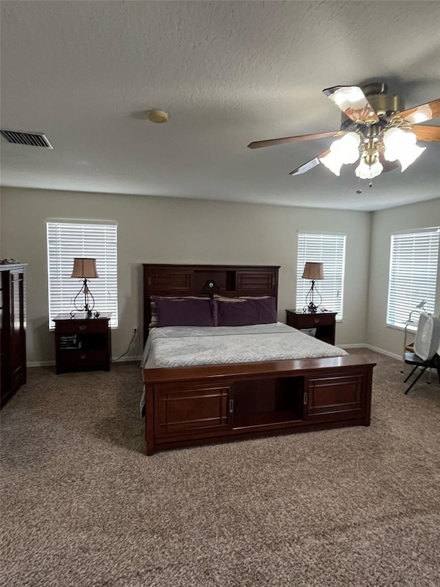 bedroom featuring carpet floors, ceiling fan, and baseboards